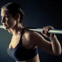 Силовая тренировка со штангой и блинами