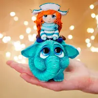 Мамонтенок с девочкой