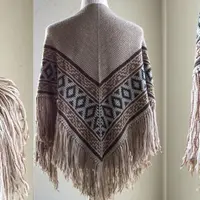 Тёплая шаль спицами Textile