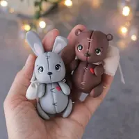 Подвижные игрушки мишутка и зайчонок