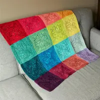 Детский ажурный плед спицами из мотивов Vivid