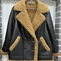 Дубленка с меховой отделкой по краю